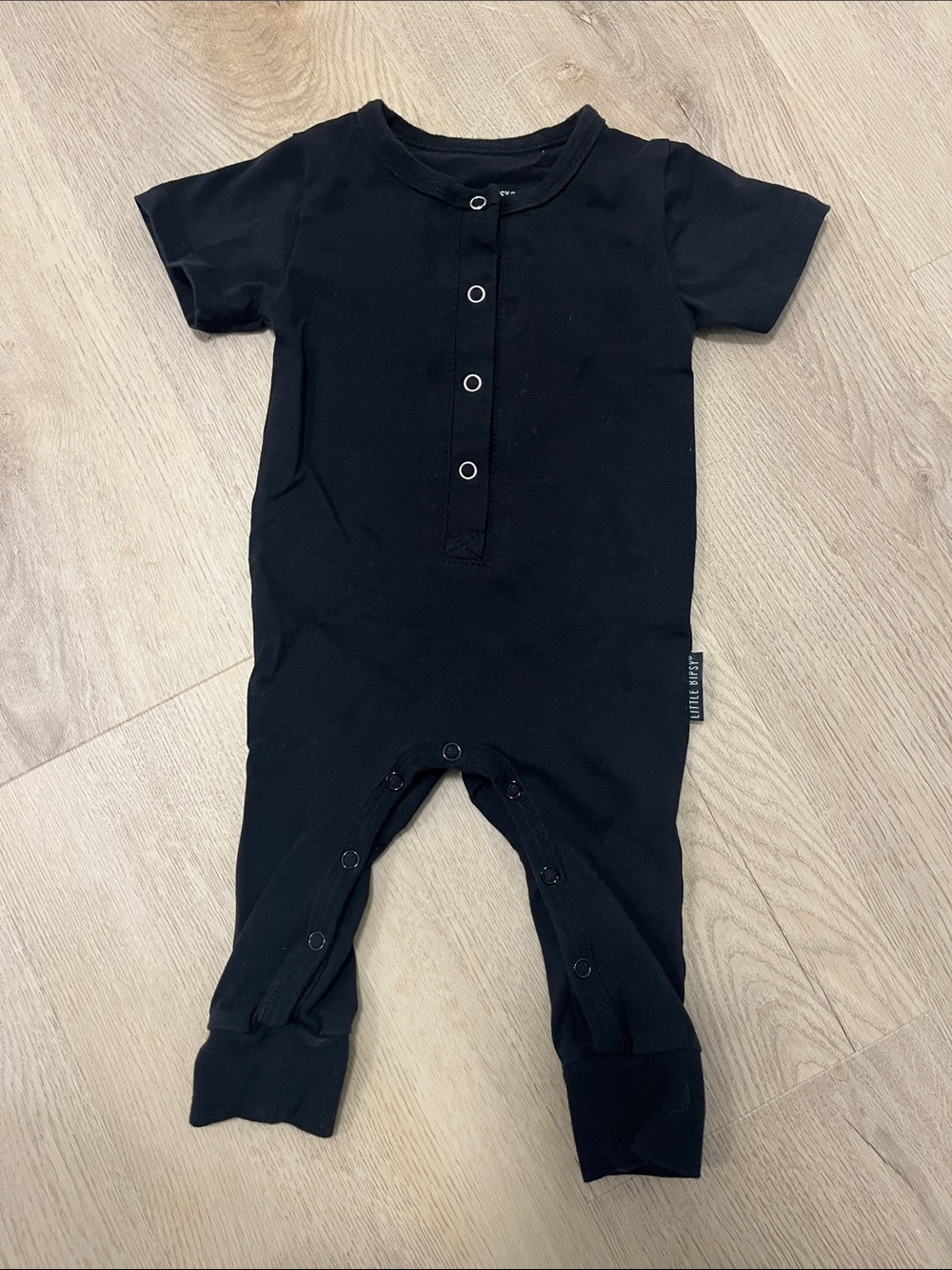Little Bipsy Black Short-Sleeve Snap Romper